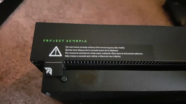 Removing the Xbox One X's sticker. The World's Most Powerful Sticker.